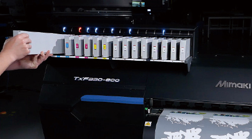 Replace ink without stopping production
